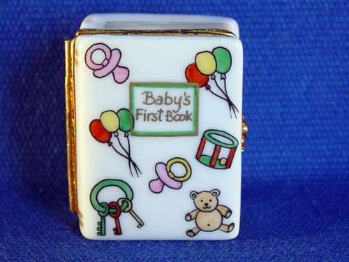 WHITE PHOTO ALBUM W/TOYS